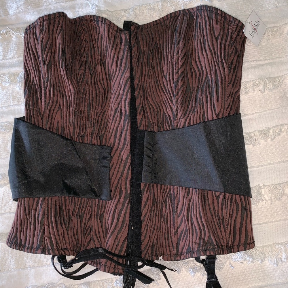 Corsets from Fredricks of Hollywood.